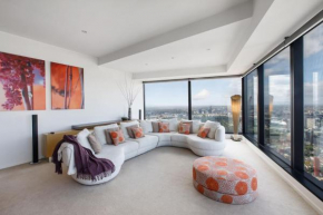 Modern meets Retro in Penthouse with Soaring Views